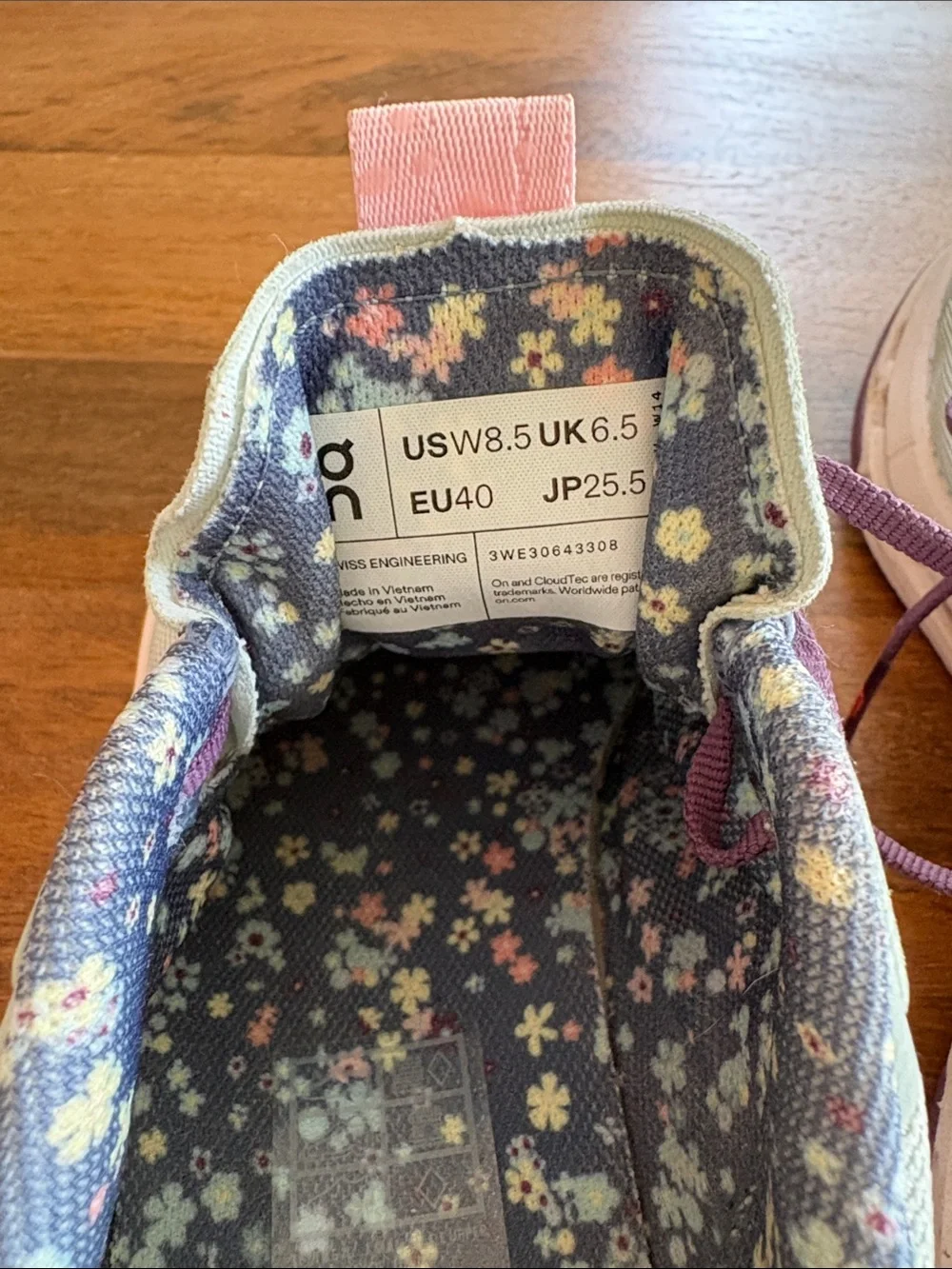 On Cloud- Women's running shoes Light Blue with Pink & Purple Accent